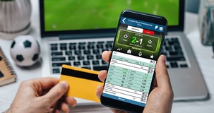 Gioco online: limite di 100 euro settimanali per la ricarica in contanti