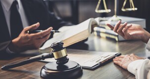 Con la sottoscrizione dell'atto di adesione l'avviso di accertamento non è più impugnabile