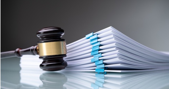 La presa in carico delle somme accertate è impugnabile senza la notifica dell'atto presupposto